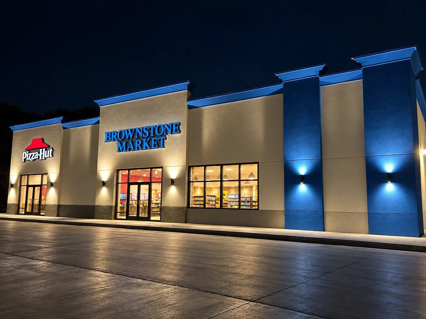 Brownstone Market of Marion storefront — edited nighttime presentation image